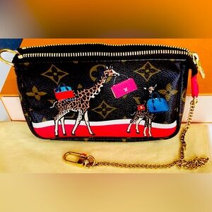 Authentic Louis Vuitton Pink Monogram Canvas Giraffe Print Pochette
